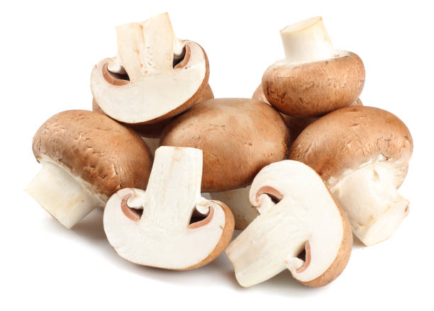 istock Fresh champignon mushrooms isolated on white background 950456632