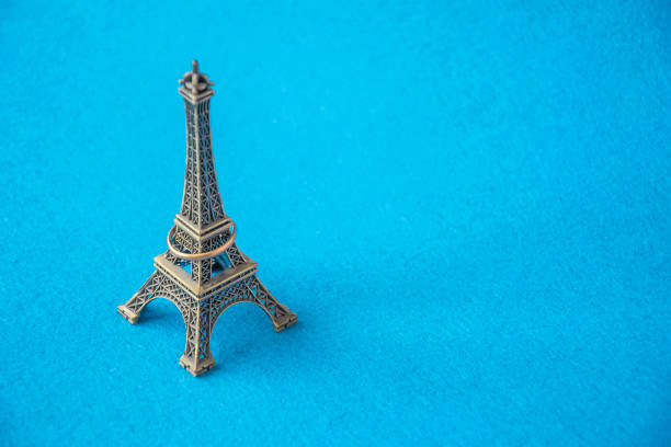 istock Eiffel tower small metal model with jewelry ring 950456864