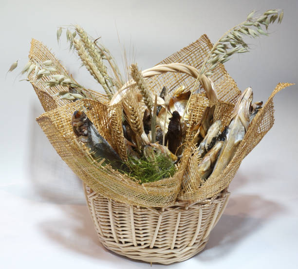 istock Wicker basket with dried salted fish bouquet of fish 950456982