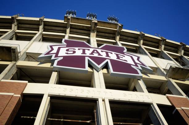 Large sign on Davis Wade Stadium at Misssissippi State University Mississippi State University, Mississippi, USA - April 16, 2018: Large M State and engraved Mississippi State signs on the west side of Davis Wade Stadium at MSU. mississippi state university stock pictures, royalty-free photos & images