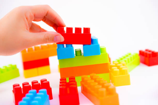 istock close up of child toy bricks construction on white background 950463596