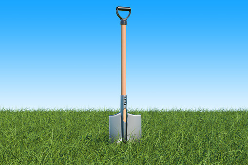 Shovel in a deep grass against blue sky, 3d rendering