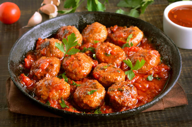 istock Meatballs with parsley in cast iron pan 950467920
