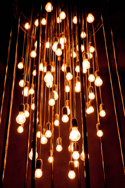 istock installation group of light bulbs in the dark 950468204