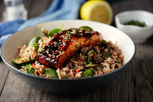Home made freshness  wild rice salad with grilled teriyaki salmon fillet