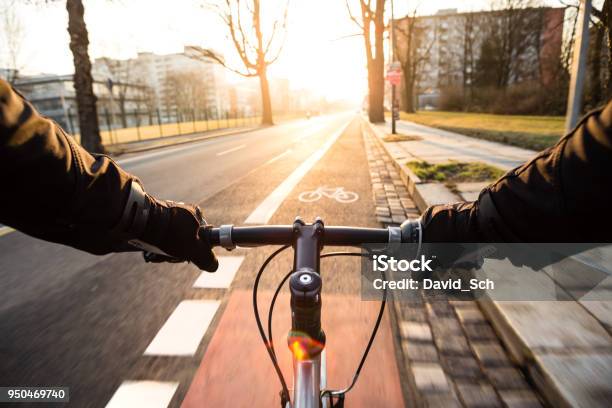 Firstperson View Of Cyclist In The City At Morning Stock Photo - Download Image Now
