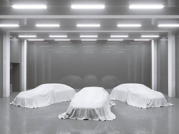 istock hangar with photo studio and covered with cloth car. 3d rendering, illustration showing,  silk,  smooth,  studio 950473380