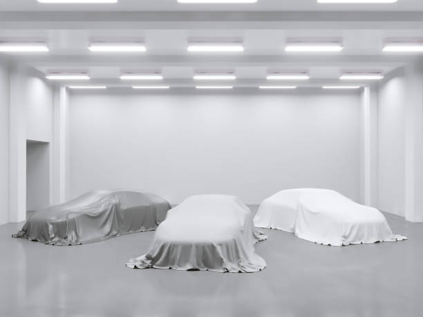 istock hangar with photo studio and covered with cloth car. 3d rendering, illustration showing,  silk,  smooth,  studio 950473642