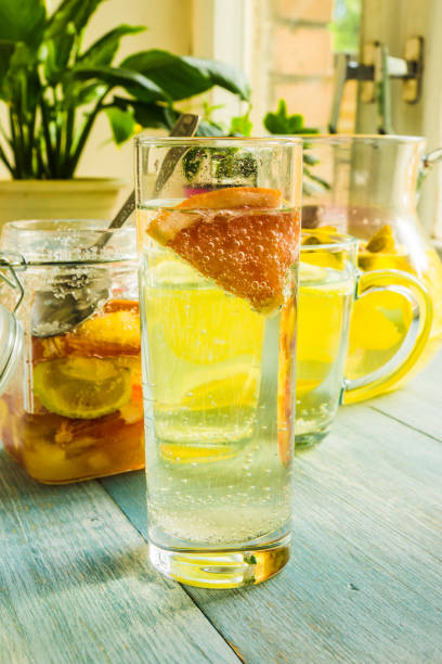 istock A glass of homemade lemonade with a grapefruit on a rustic background 950479378