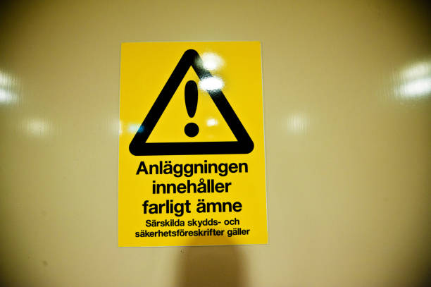 istock Dangerous Material. Special Protective Clothing Needed Warning Sign (In Swedish) On A Door 950482232