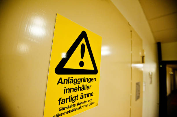 istock Dangerous Material. Special Protective Clothing Needed Warning Sign (In Swedish) On A Door 950482272
