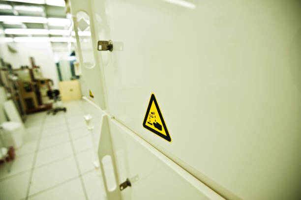 istock Warning or Hazard Sign / Label: Highly Corrosive Chemical Caution Sign On Storage Cabinet 950482332