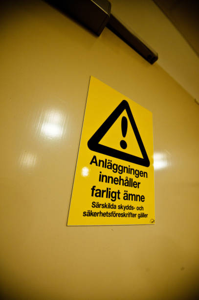 istock Dangerous Material. Special Protective Clothing Needed Warning Sign (In Swedish) On A Door 950484538