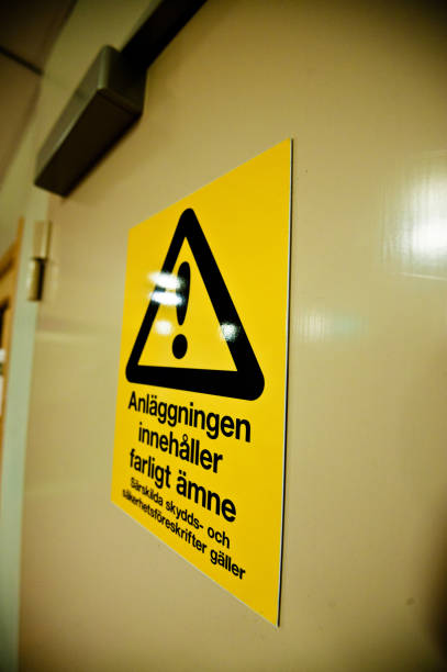 istock Dangerous Material. Special Protective Clothing Needed Warning Sign (In Swedish) On A Door 950485394