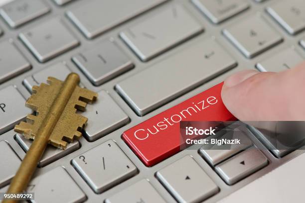 A Finger Press A Button With Text Customize On A Keyboard Stock Photo - Download Image Now