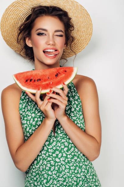 istock Woman with water melon 950495422
