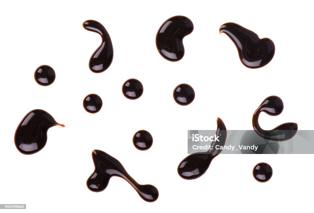 Chocolate syrup drop isolated on white background. Top view Chocolate syrup drop isolated on white background. Top view. Balsamic Vinegar Stock Photo