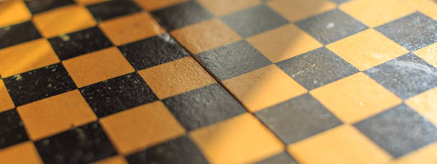 istock Vintage wooden chess on the chess board 950499180