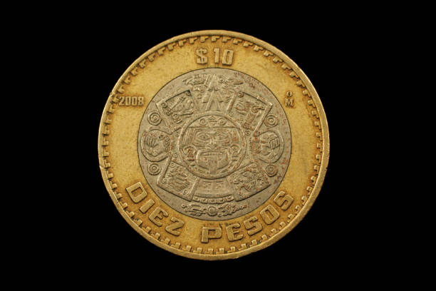 istock Mexican Ten Peso Coin Isolated On A Black Background 950499502