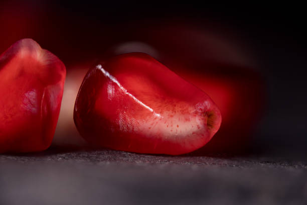 istock Seeds of a ripe pomegranate 950499506