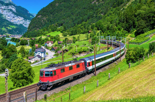 Intercity train climbs up the Gotthard railway. The traffic will be diverted to the Gotthard Base Tunnel in December 2016.