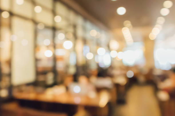 istock Restaurant cafe or coffee shop interior with people abstract defocused blur background 950510884