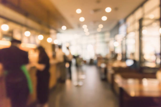 istock Restaurant cafe or coffee shop interior with people abstract defocused blur background 950510894