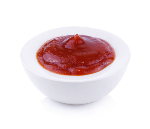 istock tomato sauce or ketchup isolated on a white background 950515266