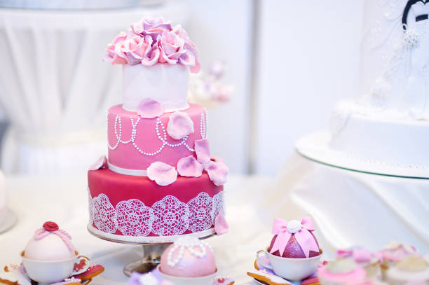 istock White wedding cake decorated with sugar flowers 950515656