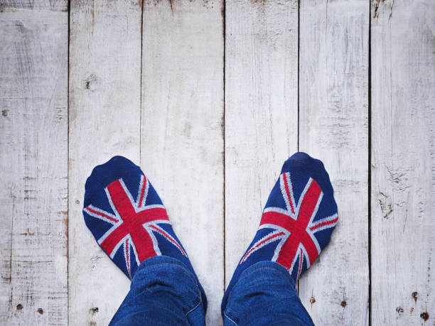 istock Selfie feet wearing socks with British flag pattern 950520134