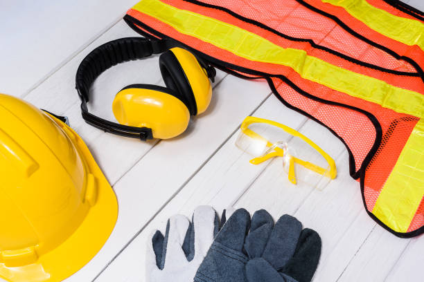 istock Standard construction safety equipment on wooden table 950523496