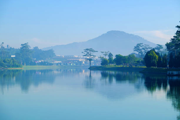 istock Da Lat morning with lake in fog 950526748