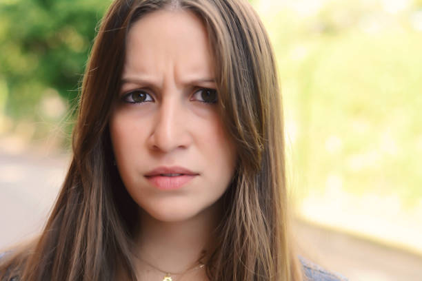 istock Young woman having uncertain and frustrated look. 950533092