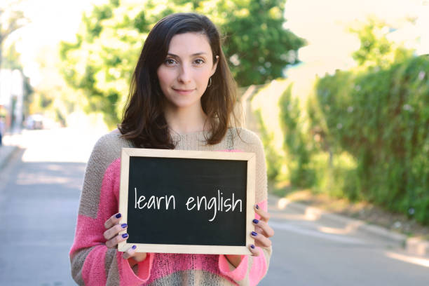 istock Woman holding chalkboard with 