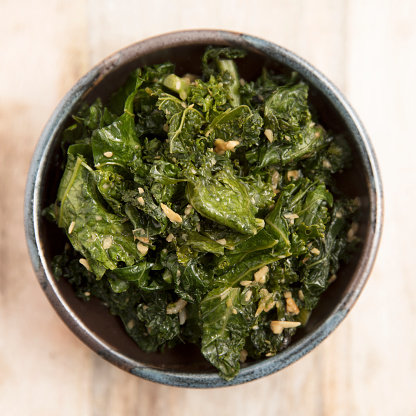 Stir fried kale with ginger and garlic flat lay.
