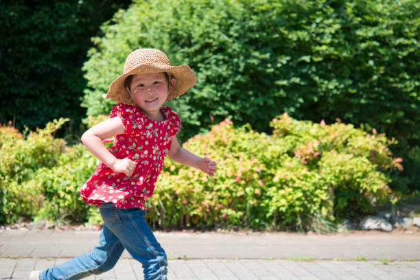 istock Little girl running 950546896