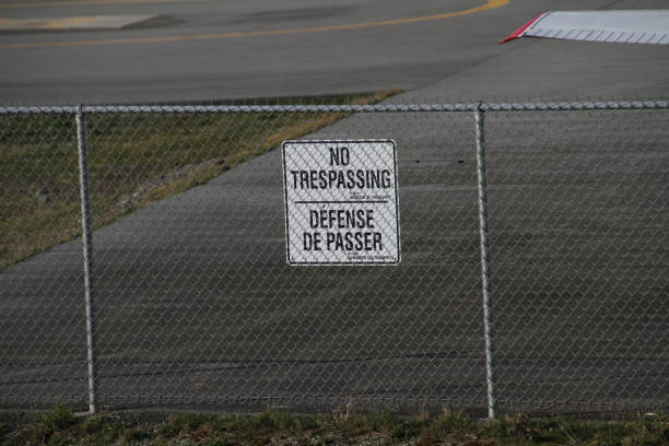 istock A no trespassing sign on a fence