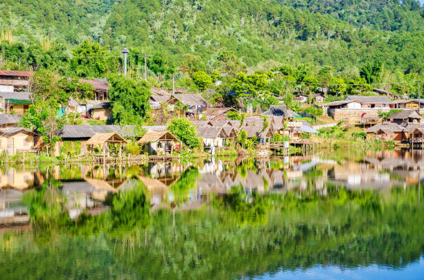 istock reflection of old village in ban rak thai 950554978