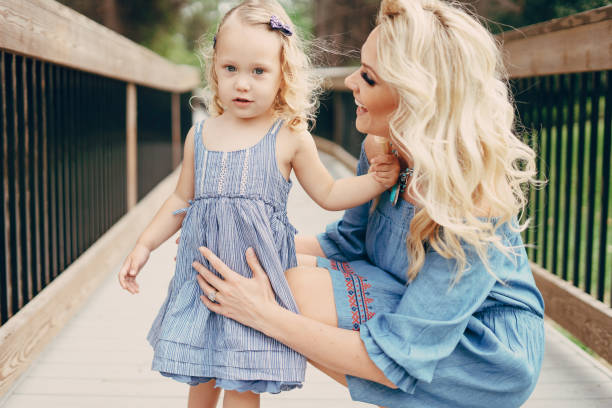 istock young family on the street 950558778