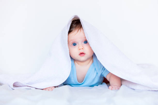 istock Little child boy with blue eyes 950560822