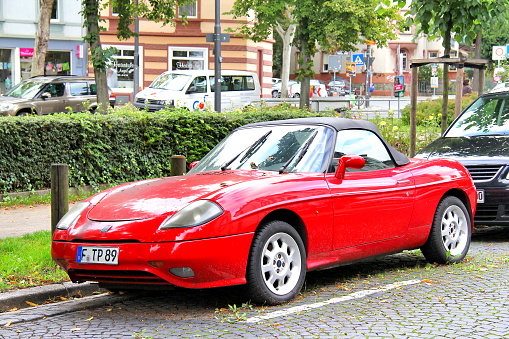 Frankfurt am Main, Germany - September 15, 2013: Motor car Fiat Barchetta in the city street.