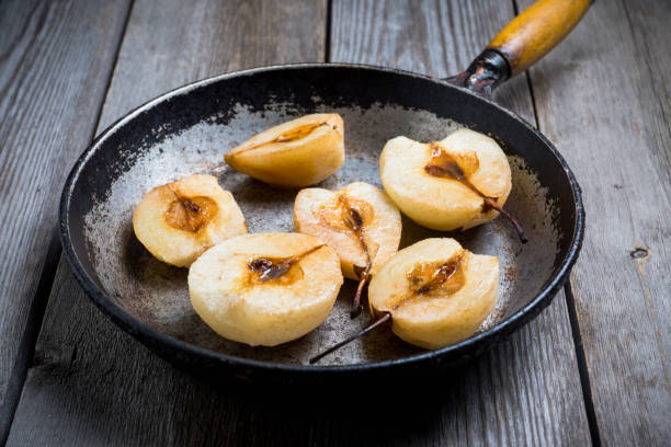 istock Grilled pears with cinnamon and honey on the rustic background 950567896