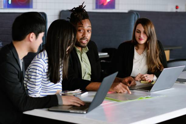 istock Team of young creatives working together 950568148
