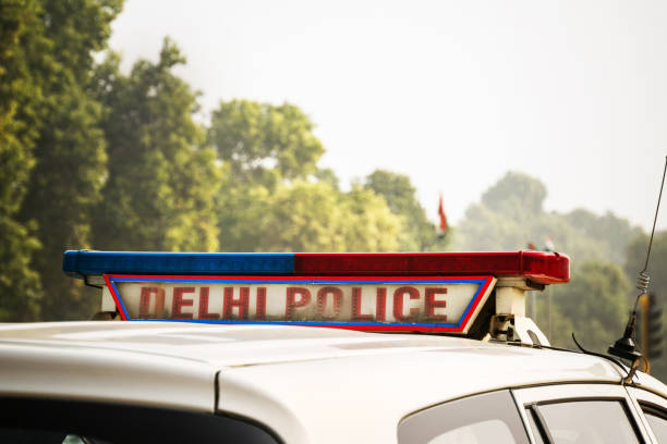 A police car on the street A police car on the street in New Delhi, India, maharashtra photos stock pictures, royalty-free photos & images