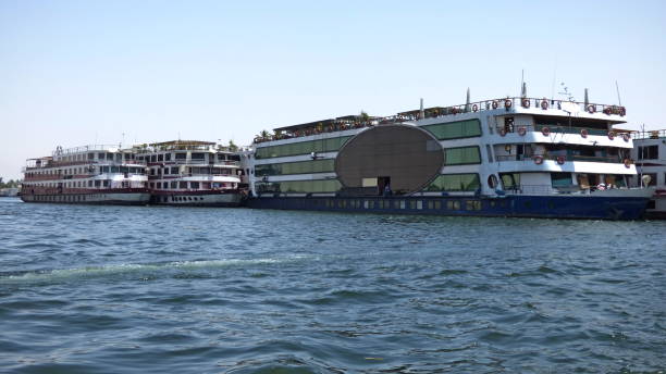 istock Egypt - Nile cruise ships seen from the shore 950572598