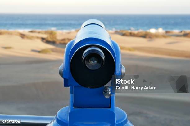 Binoculars Telescope On The Beach Straight Ahead Stock Photo - Download Image Now