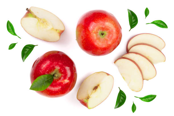 istock red apples with slices and leaves isolated on white background top view. Set or collection. Flat lay pattern 950574478