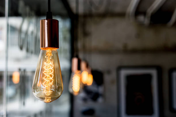 istock Vintage light bulb hanging on the roof 950574836