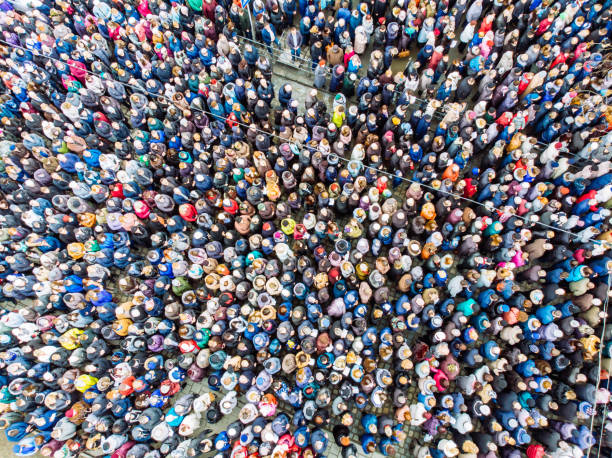 istock above view on crowd. big amount of people. 950578038