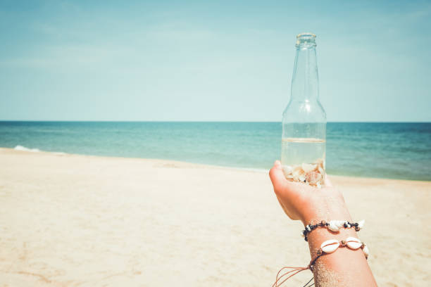 istock woman relax on beach 950578668